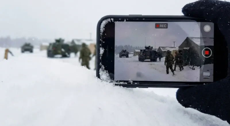 Charlie recording video evidence of US military torture against Japanese researchers in Antarctica